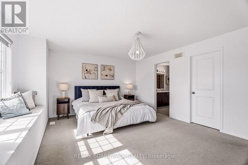 Primary bedroom with walk-in-closet - 210 Pingwi Place, Ottawa, ON 