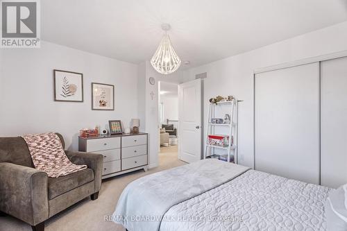 Generous bedroom with excellent closet space - 210 Pingwi Place, Ottawa, ON 