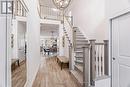 Bright & welcoming front foyer with lot of light - 210 Pingwi Place, Ottawa, ON 
