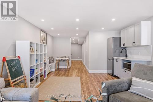Finished lower level with kitchenette - 210 Pingwi Place, Ottawa, ON 