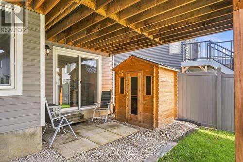 Walkout access to backyard & cedar sauna - 210 Pingwi Place, Ottawa, ON 
