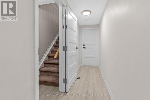Lower-level secondary unit private entrance hall - 5 Rayburn Street, Ottawa, ON 
