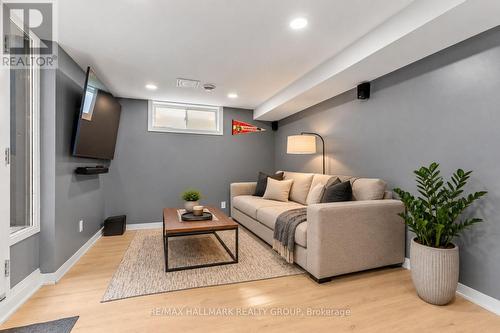 Lower-level secondary unit living room - 5 Rayburn Street, Ottawa, ON 
