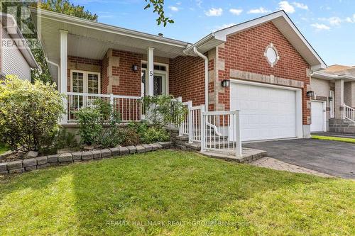 Front porch and attached garage - 5 Rayburn Street, Ottawa, ON 