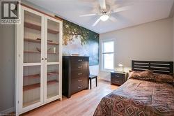 Hardwood-finish flooring throughout the room - 