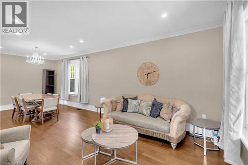 Hardwood flooring throughout, recessed lighting, crown molding, and a chandelier - 11 Tutela Heights Road, Brantford, ON 