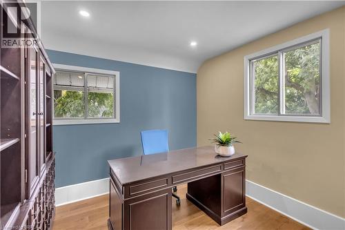 Recessed lighting, wood-finish flooring, and white trim - 11 Tutela Heights Road, Brantford, ON 