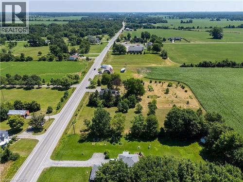 Expansive aerial perspective showcasing a rural landscape with significant acreage - 42841 Highway 3, Wainfleet, ON 