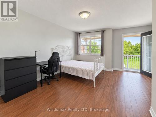 Master bedroom with walk out patio - 46 Young Crescent, Niagara-On-The-Lake (Glendale), ON 