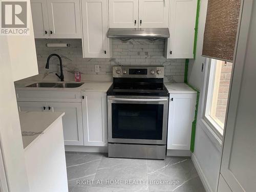 30 - 16 REXDALE BOULEVARD , Toronto, Ontario M9W 5Z3 4