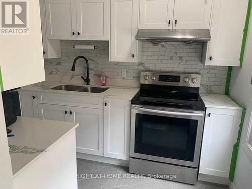 30 - 16 REXDALE BOULEVARD , Toronto, Ontario M9W 5Z3 5