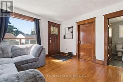 Living room with hardwood floors - 