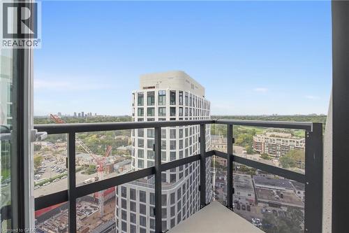 Balcony featuring glass and metal railing, concrete flooring, and surrounding cityscape - 60 Central Park Roadway Unit# 2010, Etobicoke, ON 