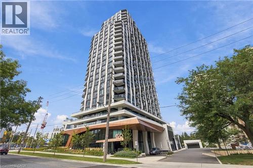 Contemporary high-rise building with a distinctive facade and individual balconies - 60 Central Park Roadway Unit# 2010, Etobicoke, ON 