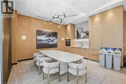 Built-in kitchen cabinetry, integrated oven, undermount sink, and recessed lighting - 60 Central Park Roadway Unit# 2010, Etobicoke, ON 