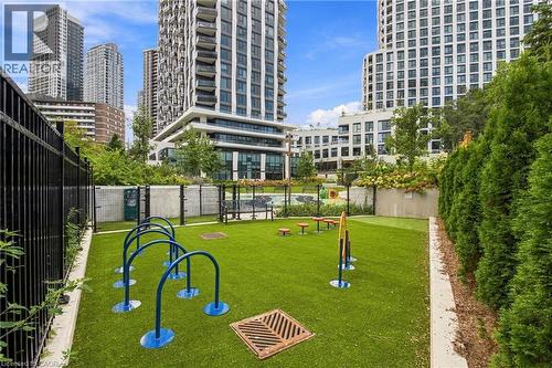 Dedicated pet amenity area with artificial turf, fenced perimeter, and various agility equipment - 60 Central Park Roadway Unit# 2010, Etobicoke, ON 