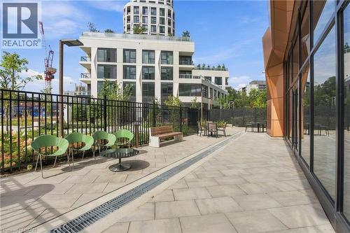 Expansive paver patio with perimeter fencing and a built-in drainage system - 60 Central Park Roadway Unit# 2010, Etobicoke, ON 