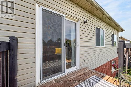 Patio doors off the kitchen to the balcony. - 126 Westland Street, St. Catharines (Rykert/Vansickle), ON 
