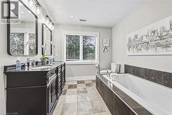 5 piece ensuite bathroom, with heated floors, double sinks, great for getting ready for the day - 