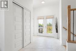 Foyer has extended hallway to garden doors - 