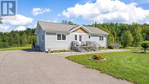 Built in 2018 home with inviting porch - 8688 Highway 511, Lanark Highlands, ON 