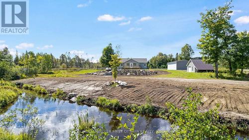 Small creek runs at the back of property - 8688 Highway 511, Lanark Highlands, ON 
