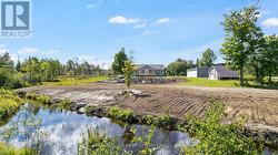 Small creek runs at the back of property - 