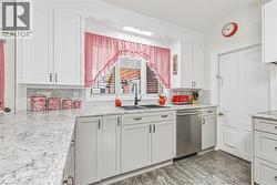 Behind Door on the Right, Main Floor Laundry and... - 