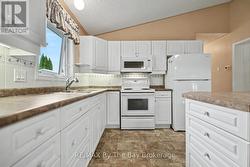 Kitchen Area with Sink Window - 
