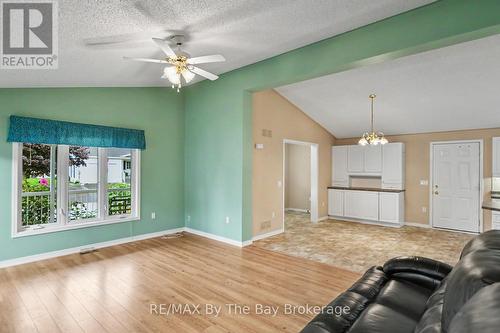 Living Area with Picture Window Over Looking Porch - 30 St James Place, Wasaga Beach, ON 