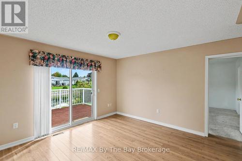2nd bedroom with Patio Doors to the Back Deck - 30 St James Place, Wasaga Beach, ON 