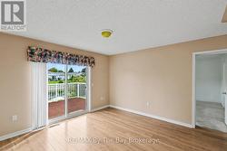 2nd bedroom with Patio Doors to the Back Deck - 