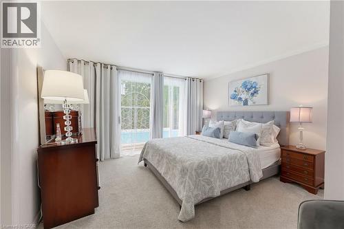 Light-toned walls complement a carpeted floor - 1316 Nevarc Drive, Burlington, ON 