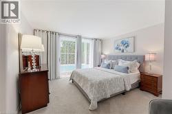 Light-toned walls complement a carpeted floor - 