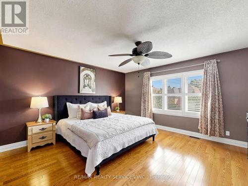 Spacious primary bedroom with hardwood floors - 127 Russell Jarvis Drive, Markham, ON 