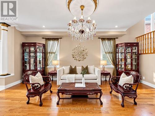 Living room with smooth ceilings and pot lights - 127 Russell Jarvis Drive, Markham, ON 