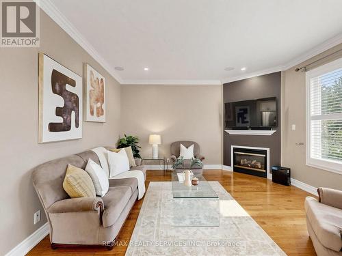 Family room: fireplace, smooth ceiling & potlights - 127 Russell Jarvis Drive, Markham, ON 