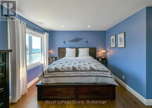 Primary bedroom with large windows - 2 - 585 Atherley Road, Orillia, ON 