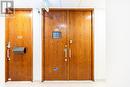 Door with an intercom and safety features - 312 - 7368 Yonge Street, Vaughan, ON 