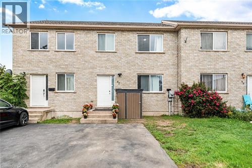 Brick exterior with multiple windows - 42 Saturn Road, Port Colborne, ON 