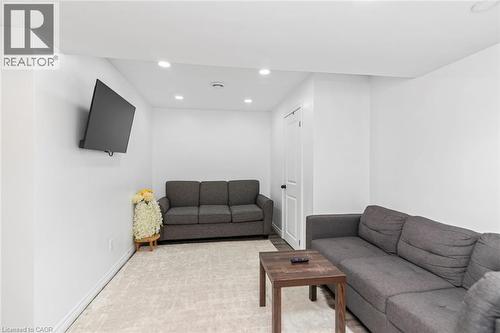 Recessed lighting, wood-finish flooring, and white walls - 42 Saturn Road, Port Colborne, ON 