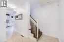Staircase with wood-finish treads and white balusters - 3148 Terraview Court, Burlington, ON 