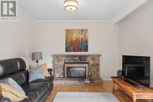 Family room has gas fireplace - 128 Holmcrest Trail, Toronto, ON 