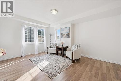 Recessed lighting, wood-finish flooring, white walls, and multiple windows - 931 Glasgow Street Unit# 27B, Kitchener, ON 