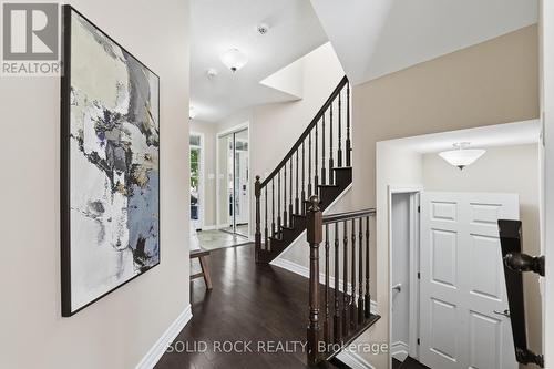 Hardwood flooring, staircase, and landings - 55 Solaris Drive, Ottawa, ON 