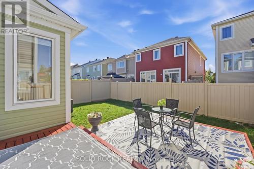 PVC fenced yard with 2 tired deck - 55 Solaris Drive, Ottawa, ON 