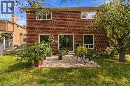 Brick exterior with multiple windows and a sliding glass door - 152 Hilda Avenue, North York, ON 