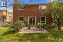 Brick exterior with multiple windows and a sliding glass door - 152 Hilda Avenue, North York, ON 