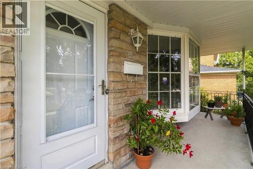 Stone-clad exterior with a covered porch - 152 Hilda Avenue, North York, ON 