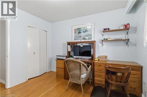 Wood-finish flooring, light-toned wall paint, and a built-in double-door closet - 152 Hilda Avenue, North York, ON 